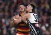 ADELAIDE, AUSTRALIA - MAY 10: Taylor Walker of the Crows and Dante Visentini of the Power during the 2025 AFL Round 09 match between the Port Adelaide Power and the Adelaide Crows at Adelaide Oval on May 10, 2025 in Adelaide, Australia. (Photo by Sarah Reed/AFL Photos via Getty Images)