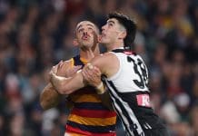 ADELAIDE, AUSTRALIA - MAY 10: Taylor Walker of the Crows and Dante Visentini of the Power during the 2025 AFL Round 09 match between the Port Adelaide Power and the Adelaide Crows at Adelaide Oval on May 10, 2025 in Adelaide, Australia. (Photo by Sarah Reed/AFL Photos via Getty Images)