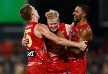 DARWIN, AUSTRALIA - MAY 10: (L-R) Noah Anderson, John Noble and Touk Miller of the Suns celebrate during the 2025 AFL Round 09 match between the Gold Coast Suns and the Western Bulldogs at TIO Stadium on May 10, 2025 in Darwin, Australia. (Photo by Michael Willson/AFL Photos via Getty Images)