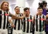 PERTH, AUSTRALIA - MAY 08: Bobby Hill of the Magpies covers the ears of Lachie Schultz as the club song is sung after winning the round nine AFL match between Fremantle Dockers and Collingwood Magpies at Optus Stadium, on May 08, 2025, in Perth, Australia. (Photo by Paul Kane/Getty Images)