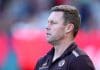 MELBOURNE, AUSTRALIA - MAY 10: Sam Mitchell, Senior Coach of the Hawks looks on during the round nine AFL match between Melbourne Demons and Hawthorn Hawks at Melbourne Cricket Ground, on May 10, 2025, in Melbourne, Australia. (Photo by Josh Chadwick/AFL Photos/via Getty Images)
