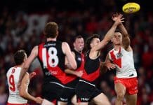 MELBOURNE, AUSTRALIA - MAY 10: Andrew McGrath of the Bombers and Caiden Cleary of the Swans compete for the ball during the round nine AFL match between Essendon Bombers and Sydney Swans at Marvel Stadium, on May 10, 2025, in Melbourne, Australia. (Photo by Morgan Hancock/Getty Images)