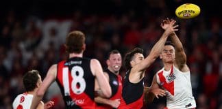 MELBOURNE, AUSTRALIA - MAY 10: Andrew McGrath of the Bombers and Caiden Cleary of the Swans compete for the ball during the round nine AFL match between Essendon Bombers and Sydney Swans at Marvel Stadium, on May 10, 2025, in Melbourne, Australia. (Photo by Morgan Hancock/Getty Images)