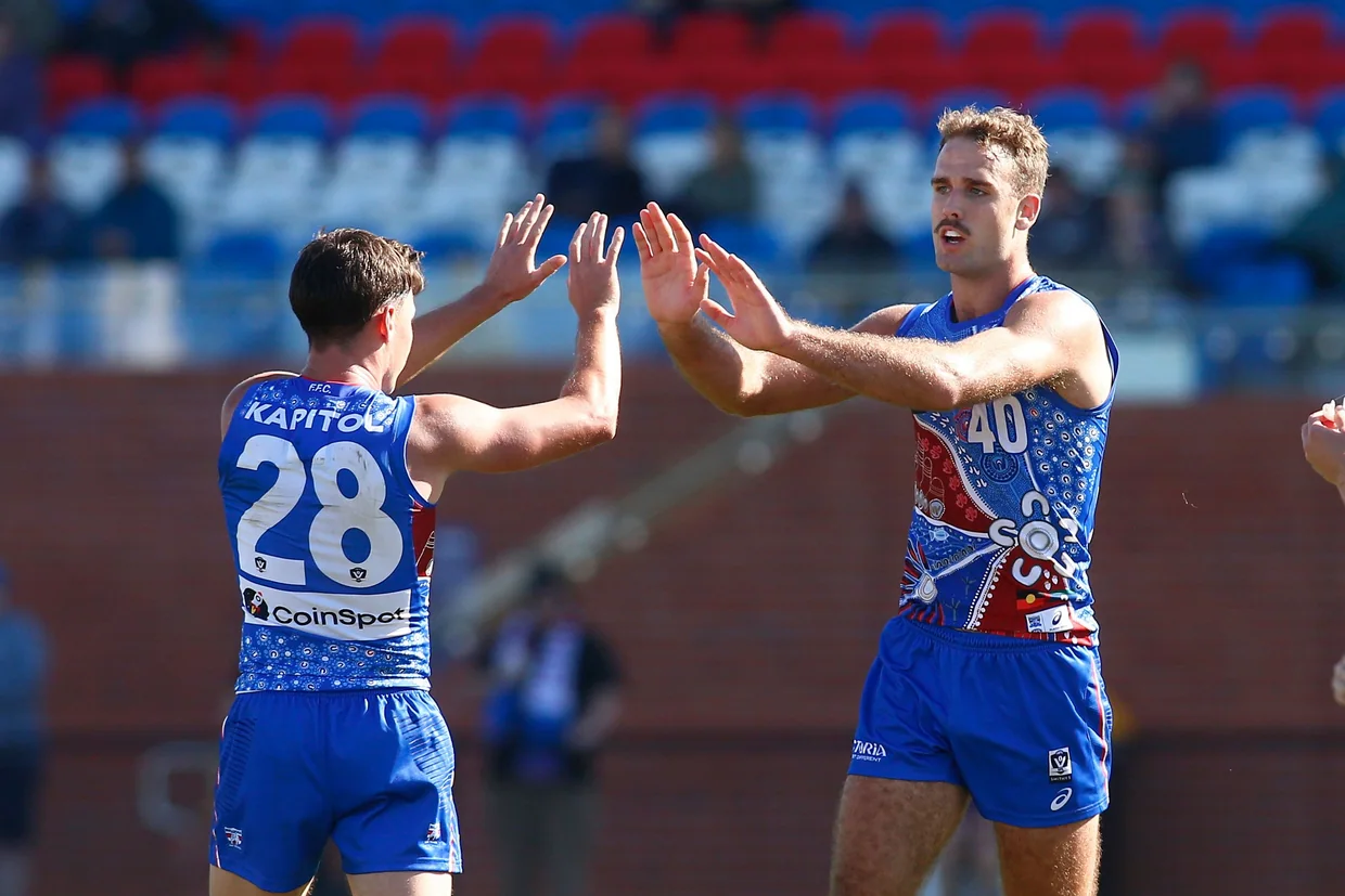 Lachlan Smith and Anthony Scott of the Bulldogs celebrate a goal during a VFL match. Credit: Cameron Grimes/AFL Photos