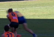 Lachie Whitfield got crunched by Ben King. Photo: Fox Footy.
