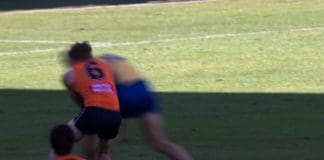Lachie Whitfield got crunched by Ben King. Photo: Fox Footy.