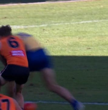 Lachie Whitfield got crunched by Ben King. Photo: Fox Footy.