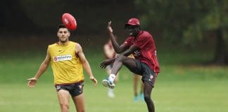 SYDNEY, AUSTRALIA - NOVEMBER 29: Riak Andrew kicks during a Sydney Swans Training Session at Bat and Ball Oval on November 29, 2024 in Sydney, Australia. (Photo by Matt King/Getty Images)
