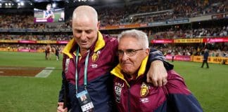 BRISBANE, AUSTRALIA - SEPTEMBER 01: Danny Daly and Chris Fagan, Senior Coach of the Lions celebrate during the 2022 AFL Second Elimination Final match between the Brisbane Lions and the Richmond Tigers at The Gabba on September 1, 2022 in Brisbane, Australia. (Photo by Michael Willson/AFL Photos via Getty Images)