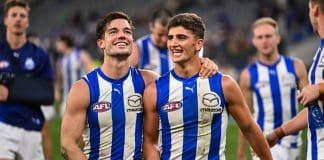 PERTH, AUSTRALIA - JUNE 08: Jy Simpkin and Harry Sheezel of the Kangaroos are happy with the win during the 2024 AFL Round 12 match between the West Coast Eagles and the North Melbourne Kangaroos at Optus Stadium on June 08, 2024 in Perth, Australia. (Photo by Daniel Carson/AFL Photos via Getty Images)
