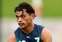 MELBOURNE, AUSTRALIA - APRIL 27: Dylan Patterson of the AFL National Academy kicks during the Marsh AFL National Academy Boys match between Australia U18 and Coburg VFL at Whitten Oval on April 27, 2025 in Melbourne, Australia. (Photo by Josh Chadwick/AFL Photos/via Getty Images)