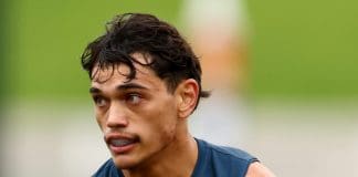 MELBOURNE, AUSTRALIA - APRIL 27: Dylan Patterson of the AFL National Academy kicks during the Marsh AFL National Academy Boys match between Australia U18 and Coburg VFL at Whitten Oval on April 27, 2025 in Melbourne, Australia. (Photo by Josh Chadwick/AFL Photos/via Getty Images)