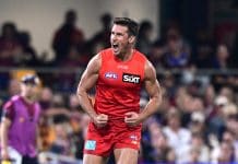 BRISBANE, AUSTRALIA - MAY 04: David Swallow of the Suns celebrates kicking a goal during the round eight AFL match between Brisbane Lions and Gold Coast Suns at The Gabba, on May 04, 2025, in Brisbane, Australia. (Photo by Bradley Kanaris/Getty Images)