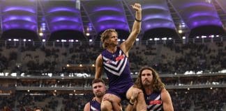 PERTH, AUSTRALIA - SEPTEMBER 06: Nat Fyfe of the Dockers is chaired from the ground by Luke Ryan and Alex Pearce after playing his final game during the AFL Elimination Final match between the Fremantle Dockers and Gold Coast Suns at Optus Stadium on September 06, 2025 in Perth, Australia. (Photo by Paul Kane/Getty Images)