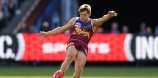 MELBOURNE, AUSTRALIA - SEPTEMBER 27: Zac Bailey of the Lions kicks the ball during the AFL Grand Final match between the Geelong Cats and the Brisbane Lions at the Melbourne Cricket Ground on September 27, 2025 in Melbourne, Australia. (Photo by Michael Willson/AFL Photos via Getty Images)