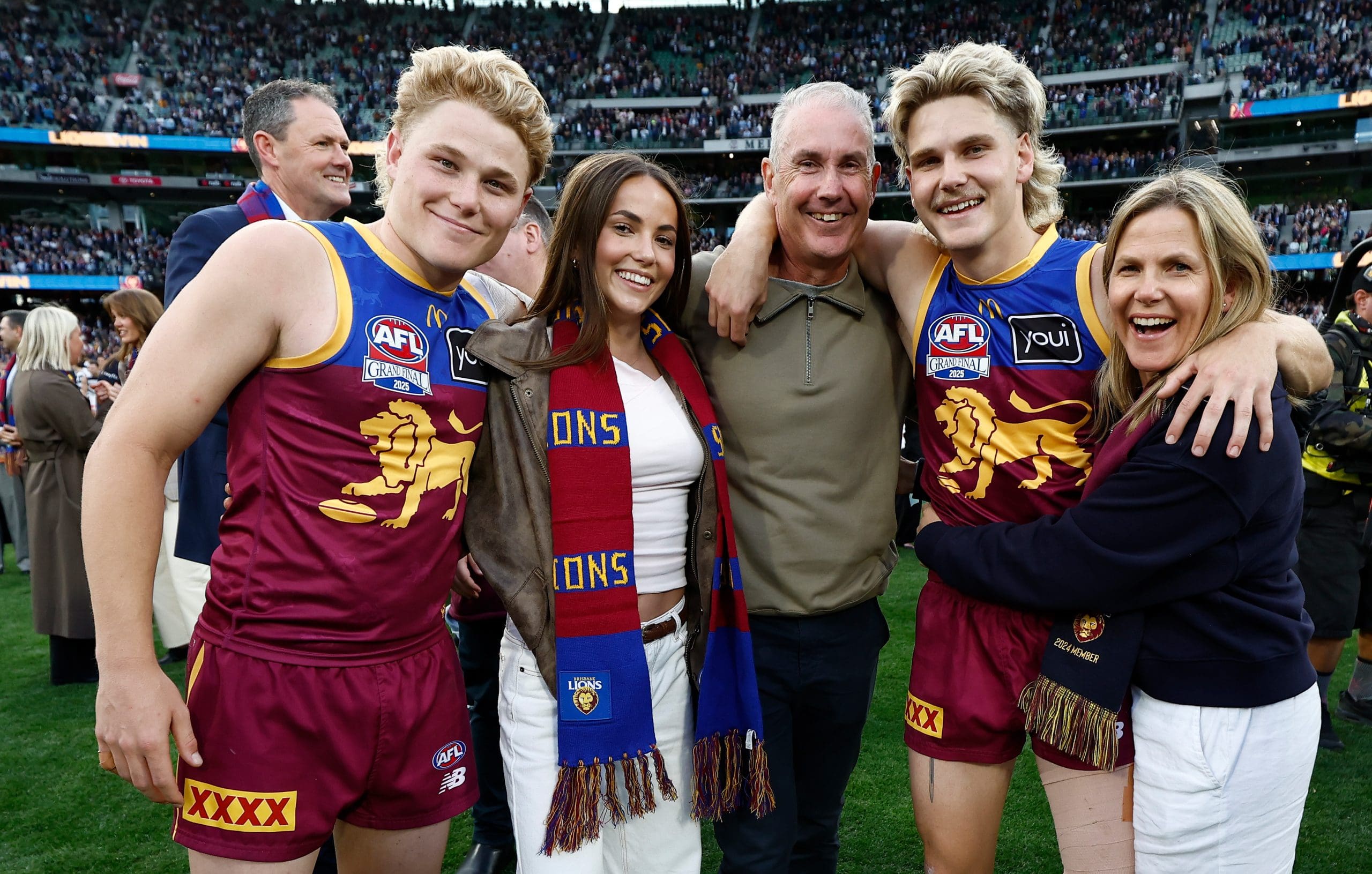 MELBOURNE, AUSTRALIA - SEPTEMBER 27: Levi Ashcroft of the Lions and Will Ashcroft of the Lions celebrate with family during the AFL Grand Final match between the Geelong Cats and the Brisbane Lions at the Melbourne Cricket Ground on September 27, 2025 in Melbourne, Australia. (Photo by Michael Willson/AFL Photos via Getty Images)