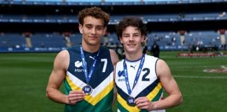 MELBOURNE, AUSTRALIA - SEPTEMBER 27: Cody Walker of Team Docherty and Noah Willliams of Team Boak pose after being awarded best on ground during the Marsh AFL National Futures Boys match between Team Boak and Team Docherty at Melbourne Cricket Ground, on September 27, 2025 in Melbourne, Australia. (Photo by Josh Chadwick/AFL Photos/via Getty Images)