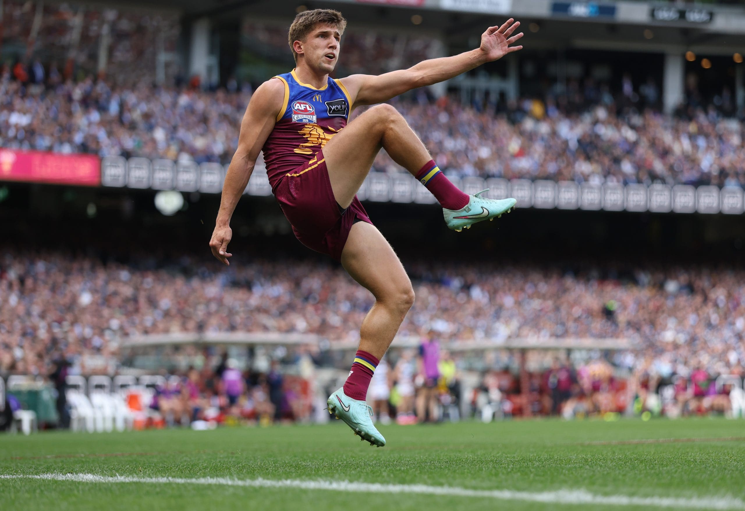 MELBOURNE, AUSTRALIA - SEPTEMBER 27: Zac Bailey of the Lions kicks the ball during the AFL Grand Final match between Geelong Cats and Brisbane Lions at Melbourne Cricket Ground on September 27, 2025 in Melbourne, Australia. (Photo by Robert Cianflone/AFL Photos/via Getty Images)