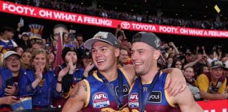 MELBOURNE, AUSTRALIA - SEPTEMBER 27: Cam Rayner of the Lions and Josh Dunkley of the Lions celebrate after winning the AFL Grand Final match between Geelong Cats and Brisbane Lions at Melbourne Cricket Ground on September 27, 2025 in Melbourne, Australia. (Photo by Cameron Spencer/AFL Photos/via Getty Images)