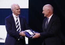 MELBOURNE, AUSTRALIA - MARCH 09: Chairman of the AFL Commission Richard Goyder (R) presents Geelong President
Craig Drummond with the 2022 AFL Premiership Flag during the 2023 Toyota AFL Premiership Season Launch at Malthouse Theatre on March 09, 2023 in Melbourne, Australia. (Photo by Daniel Pockett/AFL Photos/Getty Images)