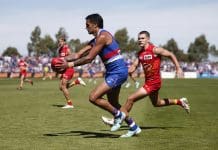 BALLARAT, AUSTRALIA - MARCH 24: Jamarra Ugle-Hagan of the Bulldogs kicks the ball during the round two AFL match between Western Bulldogs and Gold Coast Suns at Mars Stadium, on March 24, 2024, in Ballarat, Australia. (Photo by Daniel Pockett/Getty Images)
