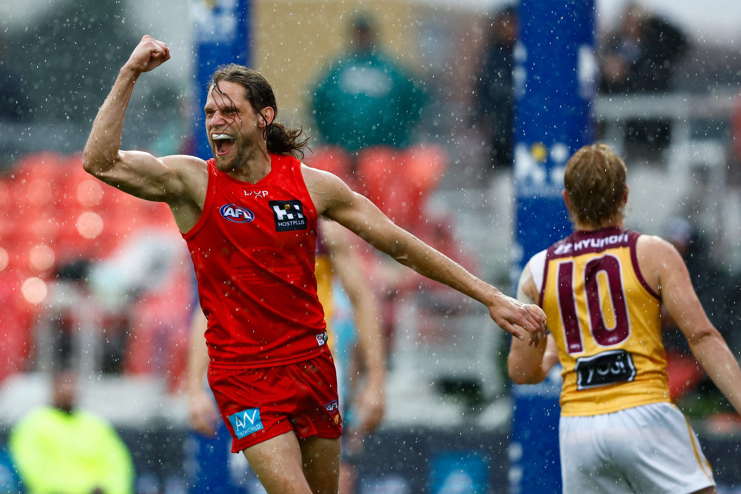 GOLD COAST, AUSTRALIA - JULY 26: Jy Farrar of the Suns celebrates a goal during the 2025 AFL Round 20 match between the Gold Coast Suns and the Brisbane Lions at People First Stadium on July 26, 2025 in the Gold Coast, Australia. (Photo by Russell Freeman/AFL Photos via Getty Images)