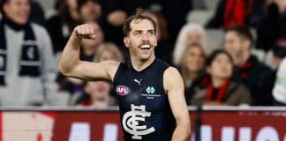 MELBOURNE, AUSTRALIA - AUGUST 21: Francis Evans of the Blues celebrates a goal during the 2025 AFL Round 24 match between the Essendon Bombers and the Carlton Blues at the Melbourne Cricket Ground on August 21, 2025 in Melbourne, Australia. (Photo by Michael Willson/AFL Photos via Getty Images)