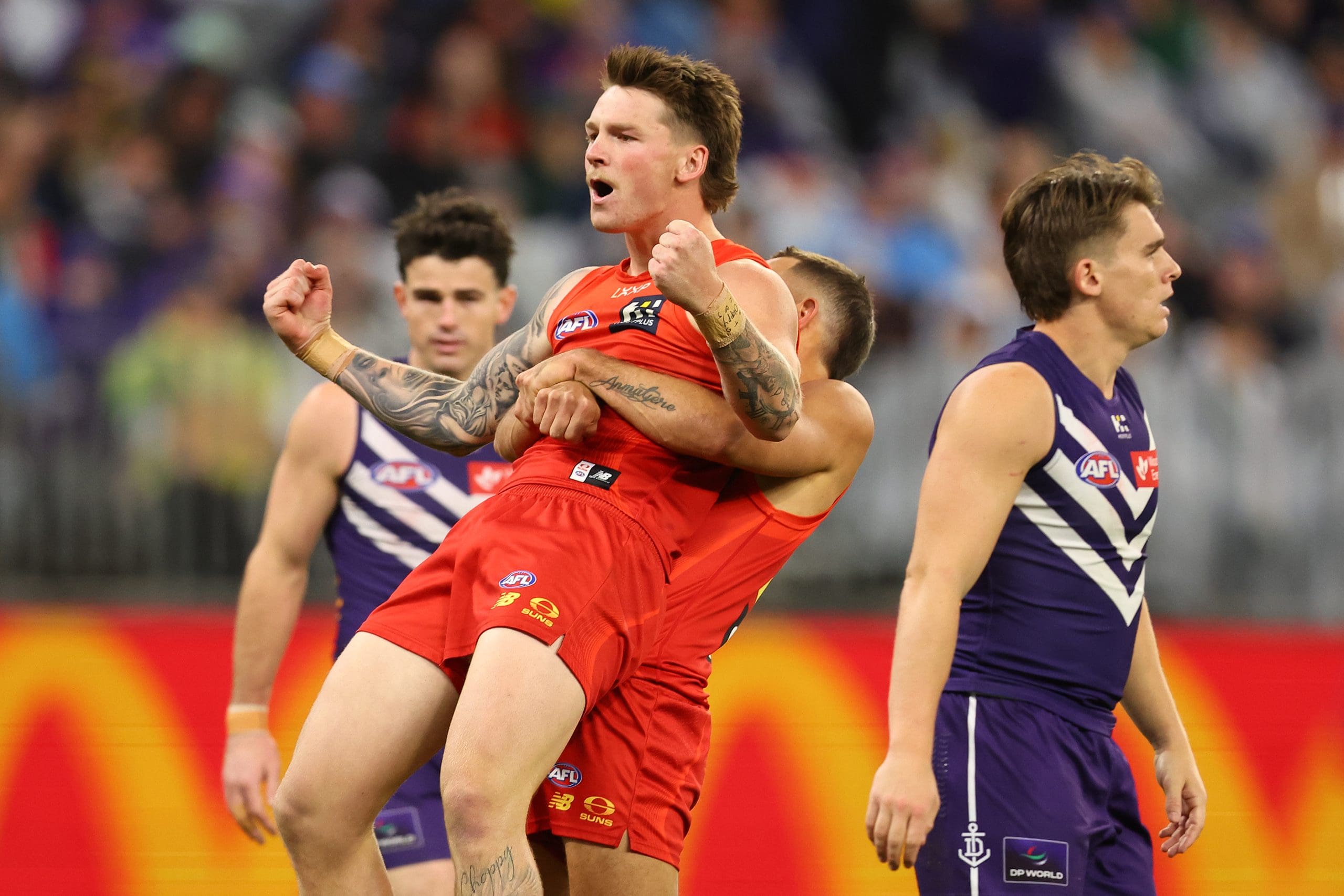 PERTH, AUSTRALIA - SEPTEMBER 06: Bailey Humphrey of the Suns celebrates a goal during the AFL Elimination Final match between the Fremantle Dockers and Gold Coast Suns at Optus Stadium on September 06, 2025 in Perth, Australia. (Photo by Paul Kane/Getty Images)