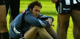 MELBOURNE, AUSTRALIA - SEPTEMBER 27:  Matthew Lokan #39 for Collingwood looks dejected after the AFL Grand Final between the Collingwood Magpies and the Brisbane Lions at the Melbourne Cricket Ground September 27, 2003 in Melbourne, Australia. (Photo by Hamish Blair/Getty Images)