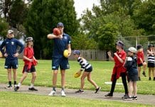 Cudgee, AUSTRALIA - FEBRUARY 06: Jeremy Cameron of the Cats plays football with students during the Geelong Cats AFL Community Camp at Cudgee Primary School on February 06, 2023 in Cudgee, Australia. (Photo by Morgan Hancock/Getty Images)