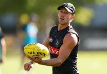 MELBOURNE, AUSTRALIA - MARCH 05: Harry Perryman of the Magpies trains during a Collingwood Magpies AFL training session at Olympic Park Oval on March 05, 2025 in Melbourne, Australia. (Photo by Morgan Hancock/Getty Images)