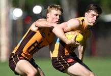 MELBOURNE, AUSTRALIA - MARCH 18: Josh Ward of the Hawks is tackled by Cam Mackenzie of the Hawks during a Hawthorn Hawks AFL training session at Waverley Park on March 18, 2025 in Melbourne, Australia. (Photo by Quinn Rooney/Getty Images)