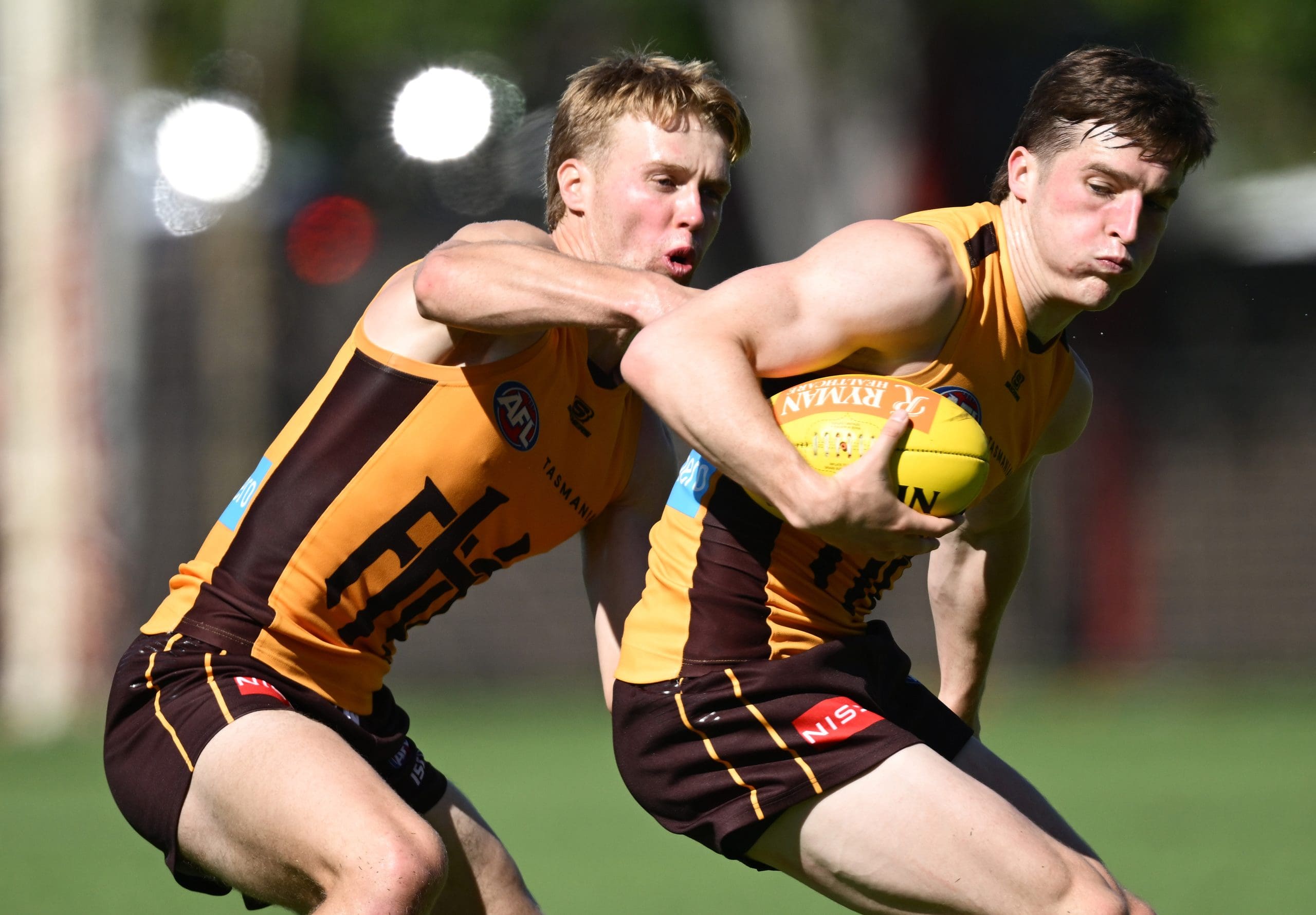 MELBOURNE, AUSTRALIA - MARCH 18: Josh Ward of the Hawks is tackled by Cam Mackenzie of the Hawks during a Hawthorn Hawks AFL training session at Waverley Park on March 18, 2025 in Melbourne, Australia. (Photo by Quinn Rooney/Getty Images)