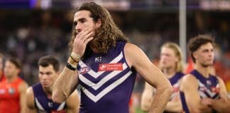 PERTH, AUSTRALIA - SEPTEMBER 06: Alex Pearce of the Dockers looks dejected during the AFL Elimination Final match between Fremantle Dockers and Gold Coast Suns at Optus Stadium on September 06, 2025 in Perth, Australia. (Photo by Janelle St Pierre/AFL Photos/via Getty Images)