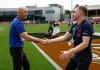 MELBOURNE, AUSTRALIA - NOVEMBER 22: Darren Crocker, Senior Coach of the Kangaroos and Mick Stinear, Senior Coach of the Demons shake hands during the 2025 AFLW First Preliminary Final match between the North Melbourne Tasmanian Kangaroos and the Melbourne Demons at Ikon Park on November 22, 2025 in Melbourne, Australia. (Photo by Michael Willson/AFL Photos via Getty Images)