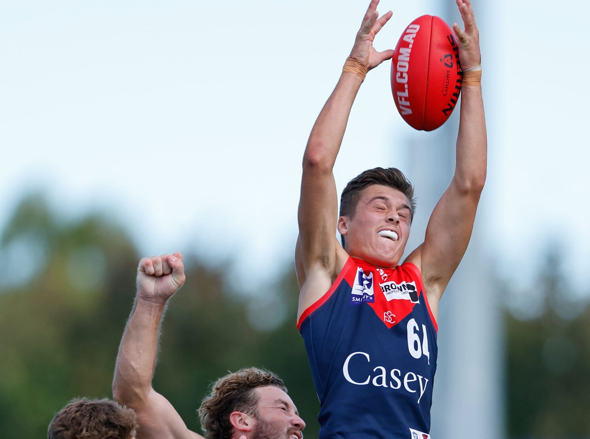 MELBOURNE, AUSTRALIA - APRIL 02: Paddy Cross of the Demons attempts to mark the ball during the 2023 VFL Round 02 match between the Casey Demons and the Sydney Swans at Casey Fields on April 2, 2023 in Melbourne, Australia. (Photo by Dylan Burns/AFL Photos via Getty Images)