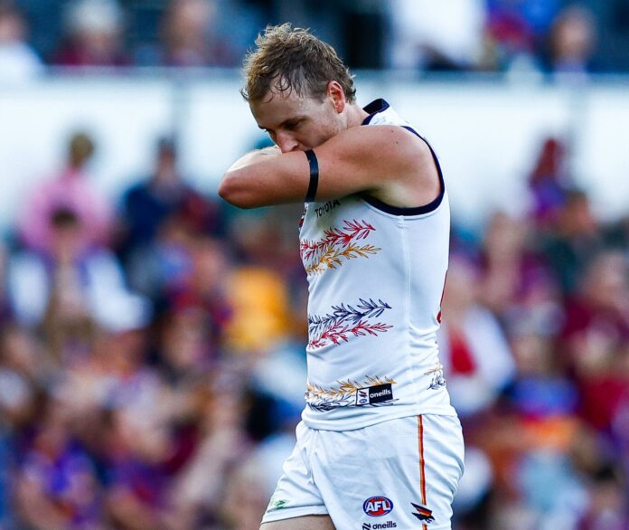 BRISBANE, AUSTRALIA - APRIL 26: Jordan Dawson of the Crows celebrates a goal during the 2026 AFL Round 07 match between the Brisbane Lions and the Adelaide Crows at the Gabba on April 26, 2026 in Brisbane, Australia. (Photo by Russell Freeman/AFL Photos via Getty Images)