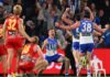 Yeehaw Zurharr: North Melbourne completes miracle comeback MELBOURNE, AUSTRALIA - MAY 23: Cameron Zurhaar of the Kangaroos celebrates kicking a goal to win the round 11 AFL match between North Melbourne Kangaroos and Gold Coast Suns at Marvel Stadium, on May 23, 2026, in Melbourne, Australia. (Photo by Daniel Pockett/Getty Images)
