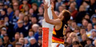 1998:  Tony Modra of Adelaide jumps to markthe ball during the Round 20 AFL Football match against Geelong in Adelaide, Australia.  Mandatory Credit: Hamish Blair /Allsport