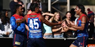 Melbourne injury shock: Savage blow in dying minutes ALICE SPRINGS, AUSTRALIA - MAY 31: Kysaiah Pickett of the Demons celebrates a goal during the 2026 AFL Round 12 match between the Melbourne Demons and the GWS Giants at TIO Traeger Park on May 31, 2026 in Alice Springs, Australia. (Photo by James Wiltshire/AFL Photos via Getty Images)