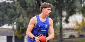 AFL Draft prospect makes nomination decision amid two-club battle Aidan McCartney at Arden St. Picture: NMFC Media