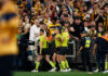 AFL vows major punishment after umpires targeted in ugly preliminary final scenes MELBOURNE, AUSTRALIA - SEPTEMBER 19: Umpires dodge bottles thrown by patrons as they leave the field during the 2026 AFL First Preliminary Final between the Hawthorn Hawks and the Brisbane Lions at the Melbourne Cricket Ground on September 19, 2026 in Melbourne, Australia. (Photo by Michael Willson/AFL Photos via Getty Images)
