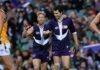 Fremantle announce inaugural Docker, former skipper as AFL premiership cup presenter PERTH, AUSTRALIA - AUGUST 06: Shaun McManus and Justin Longmuir of the Dockers celebrate a goal during the round 18 AFL match between the Fremantle Dockers and the Hawthorn Hawks at the Subiaco Oval on August 6, 2006 in Perth, Australia. (Photo by Paul Kane/Getty Images)